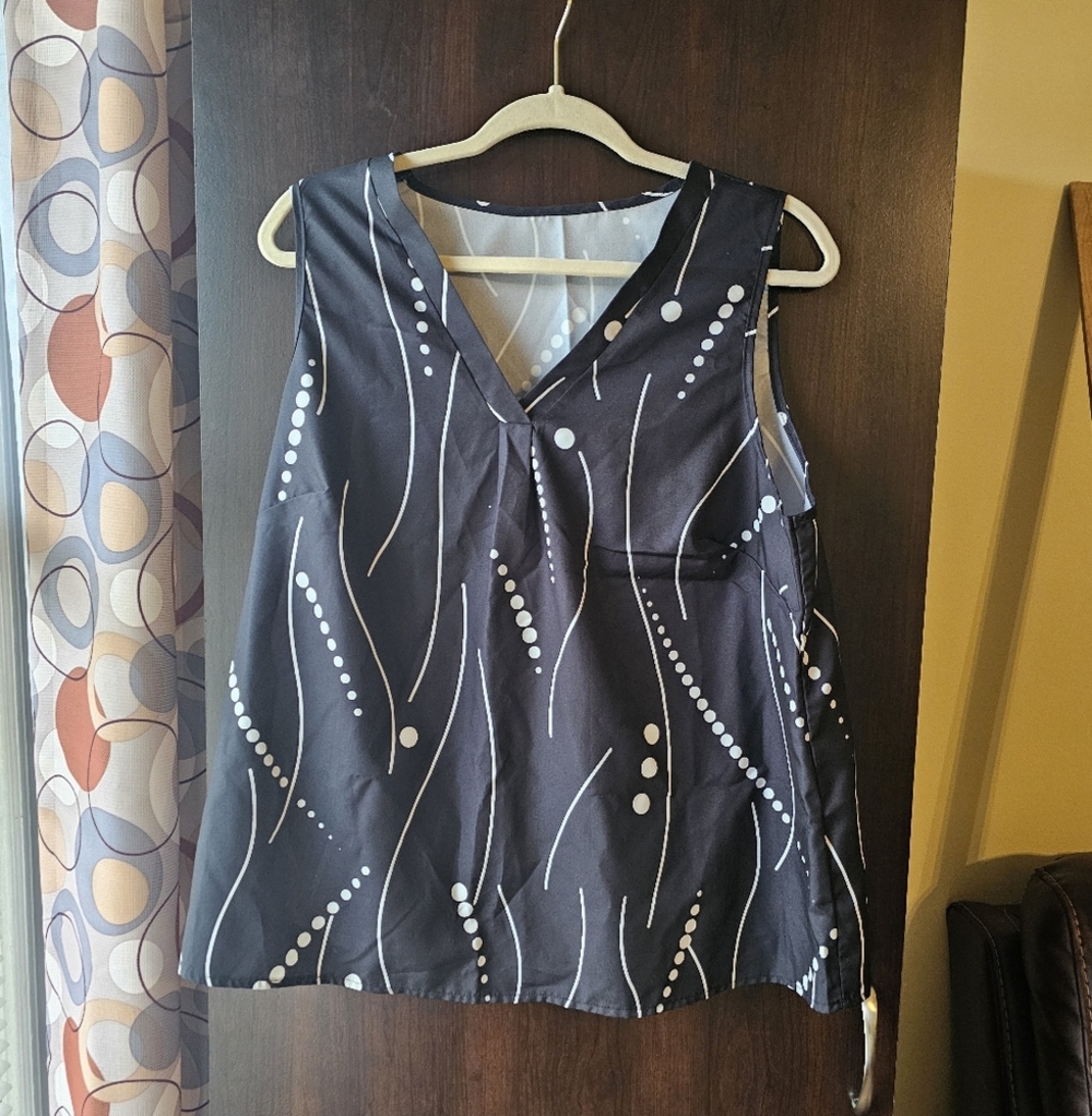 Black Sleeveless Top with White Pattern